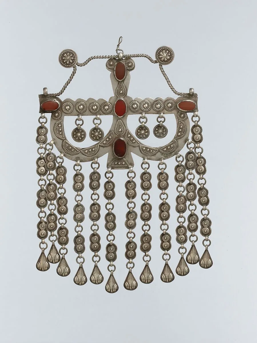Pectoral Ornament (?) — Unknown