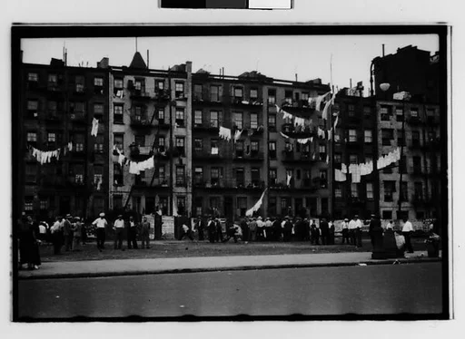 [Two 35mm Film Frames: Crowd in Front of Tenement Buildings, New York City]