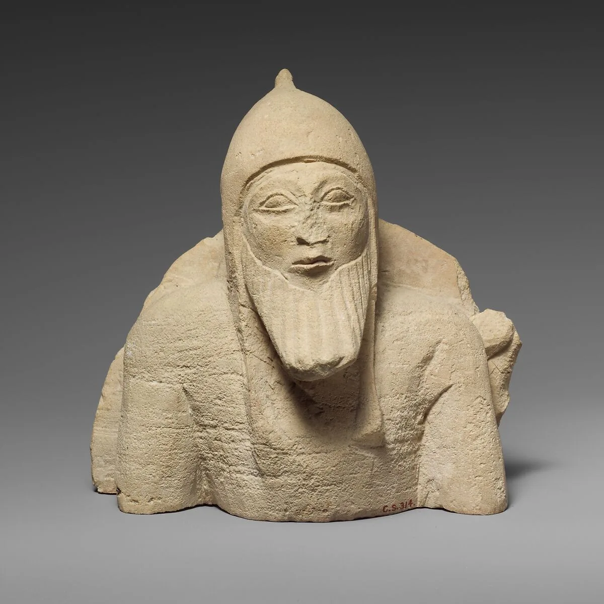 Upper part of a limestone warrior from a chariot group — Unknown