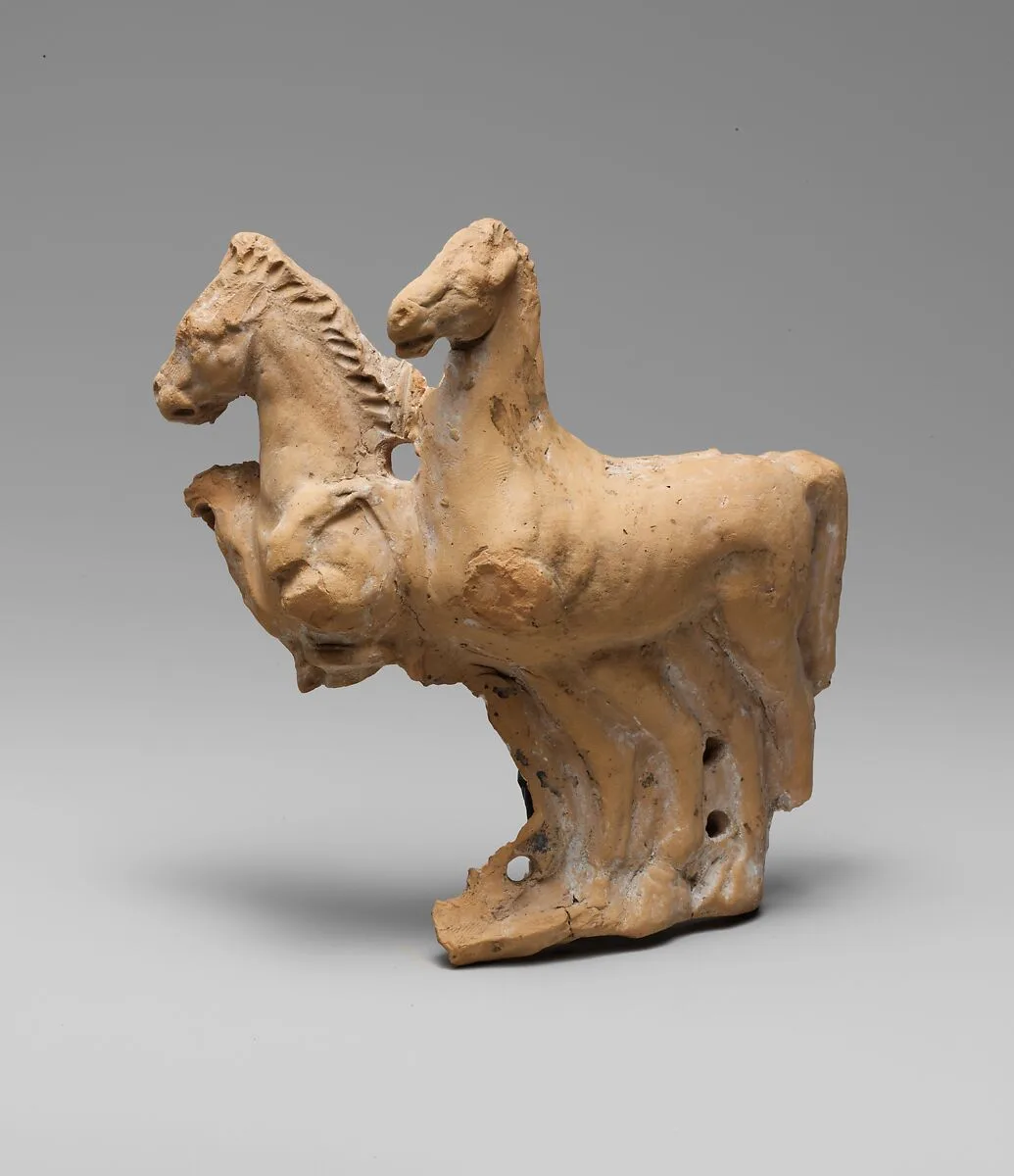 Fragmentary terracotta relief with two horses from a vase — Unknown
