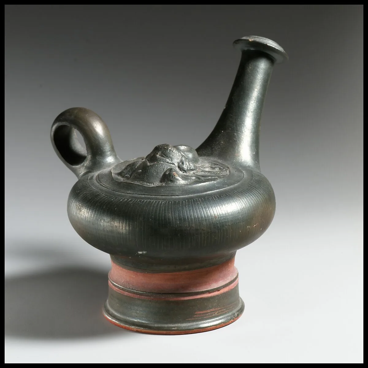 Terracotta guttus (flask with handle and vertical spout) — Unknown