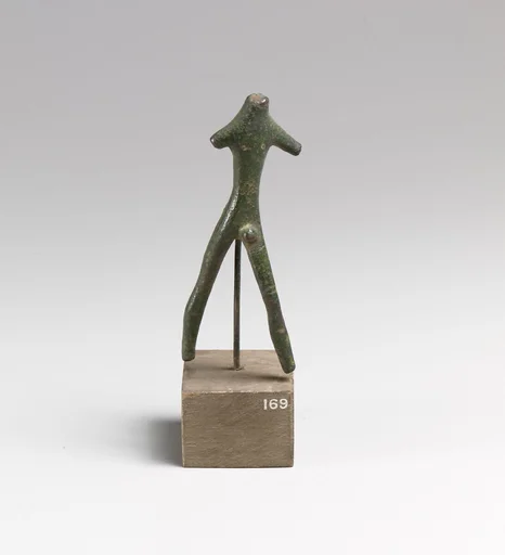 Statuette of a striding man