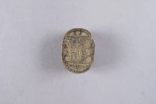 Scarab with the Representation of a Young Sun God with Enthroned Figures