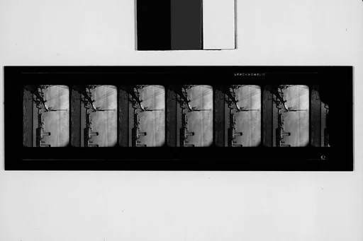 [South Seas: Six Motion Picture Film Frames of Cressida Prow in Front of Steamship]