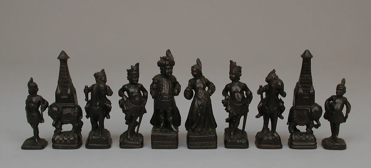 Chessmen (32) and box-board — Unknown