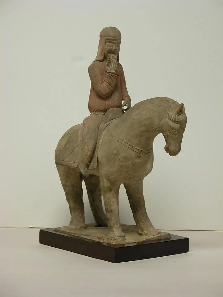 北魏 彩繪陶鼓吹樂手俑|Mounted musician (one of two) — Unknown