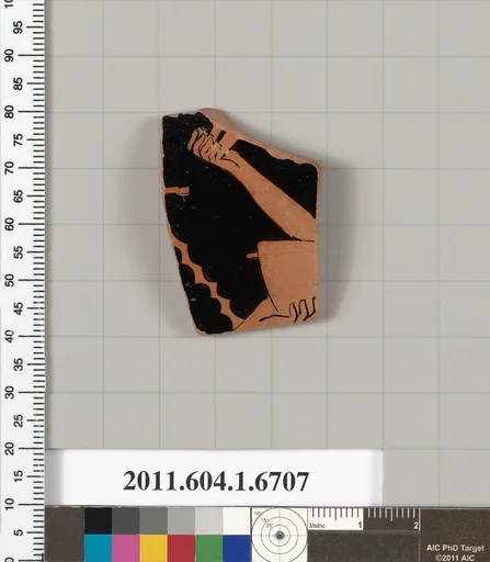 Terracotta fragment of a kylix (drinking cup)