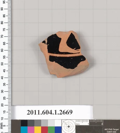 Terracotta fragment of a kylix (drinking cup)