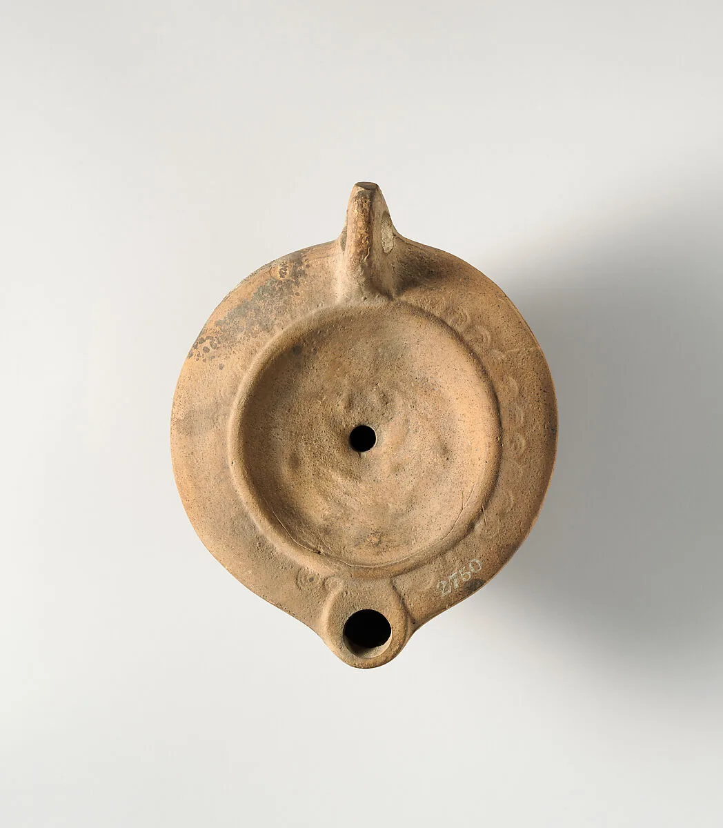 Terracotta oil lamp — Unknown