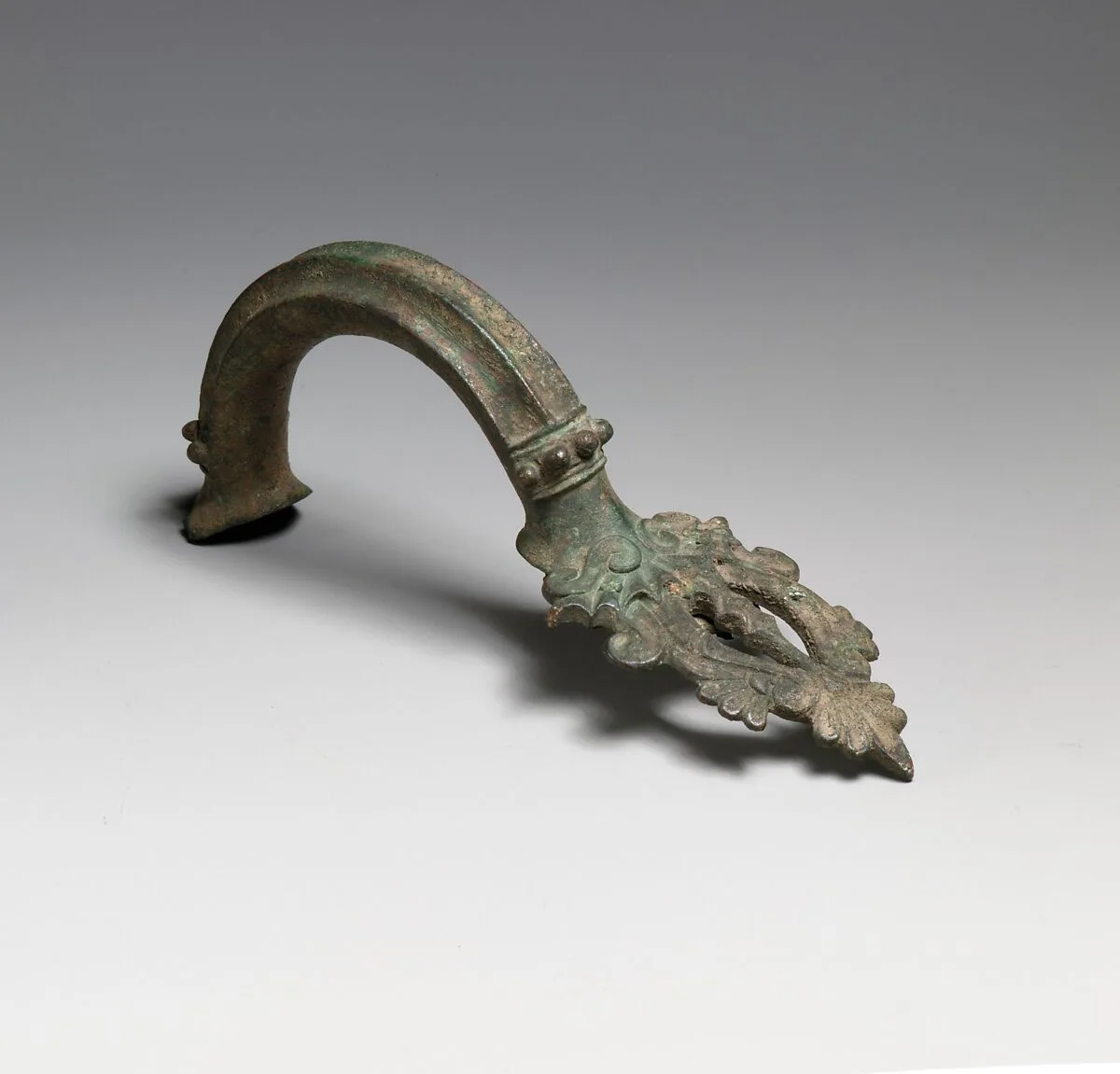 Bronze handle of a hydria (water jar) — Unknown