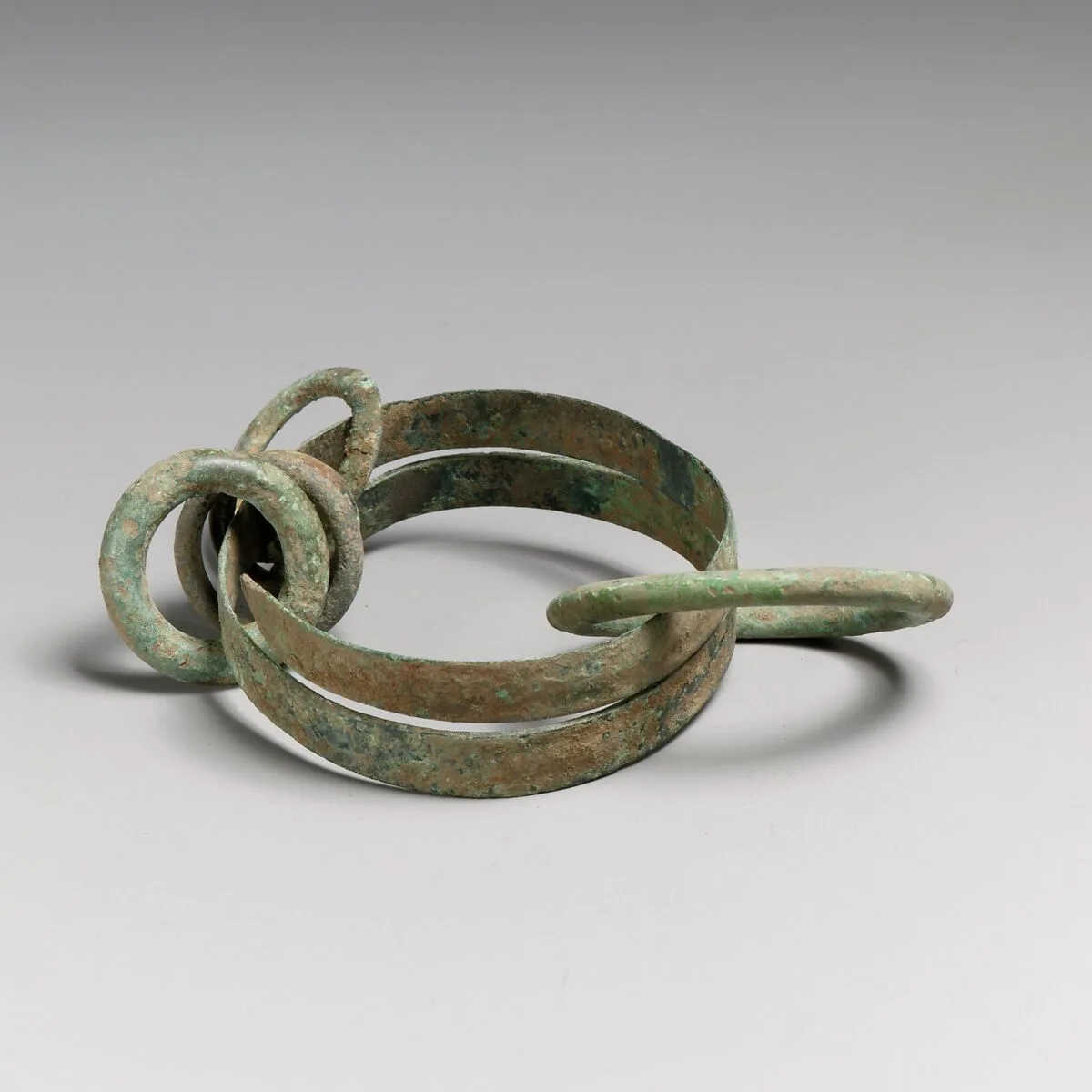 Bronze bracelet with four rings — Unknown
