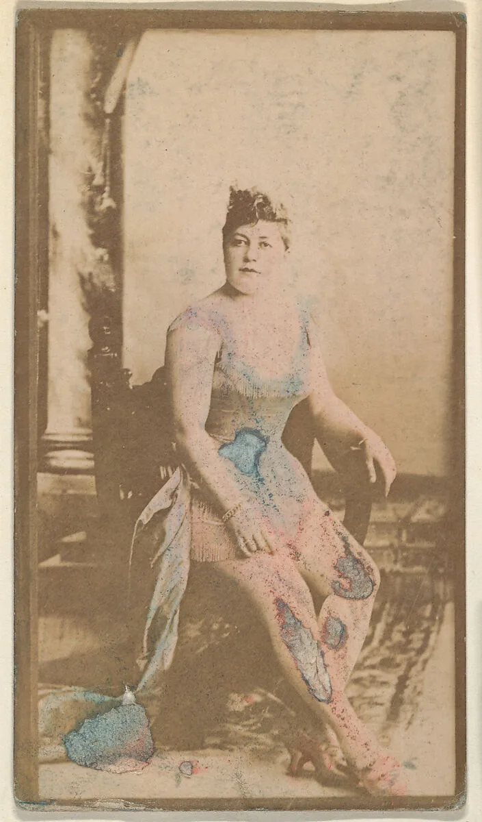 Seated actress blue hand-colored gown, from the Actresses series (N668) — Unknown