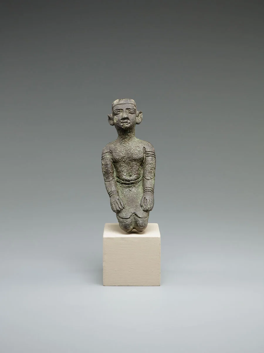 Kneeling priest — Unknown