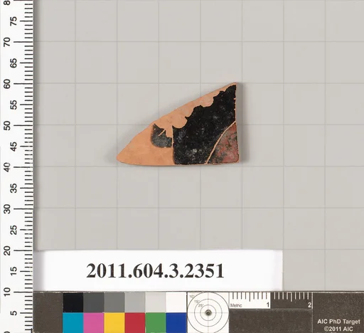 Terracotta fragment of a kylix: eye-cup (drinking cup)
