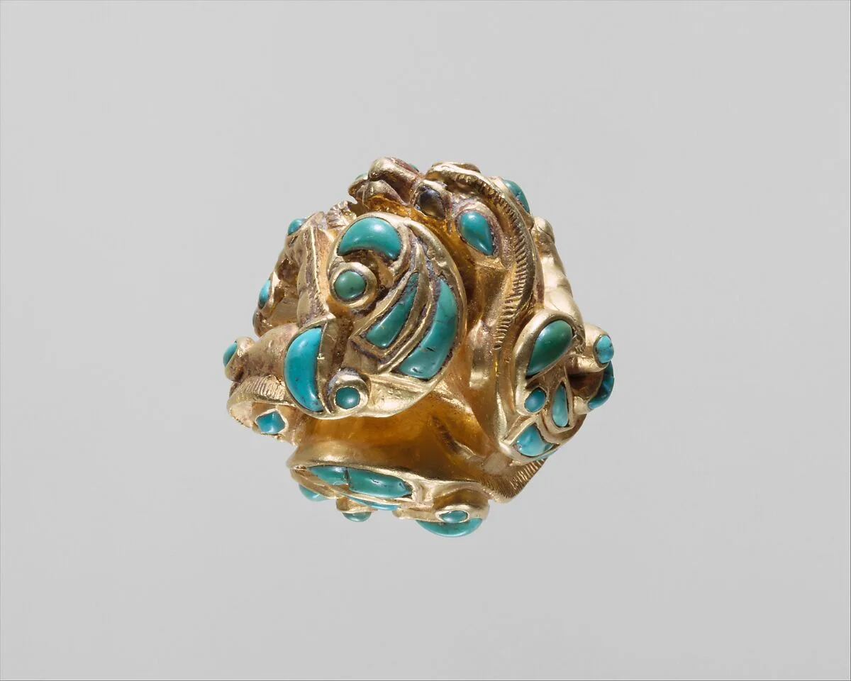 Pommel in the shape of coiled animals — Unknown
