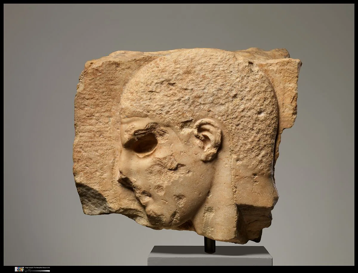 Fragment of a marble grave stele with the head of a youth — Unknown