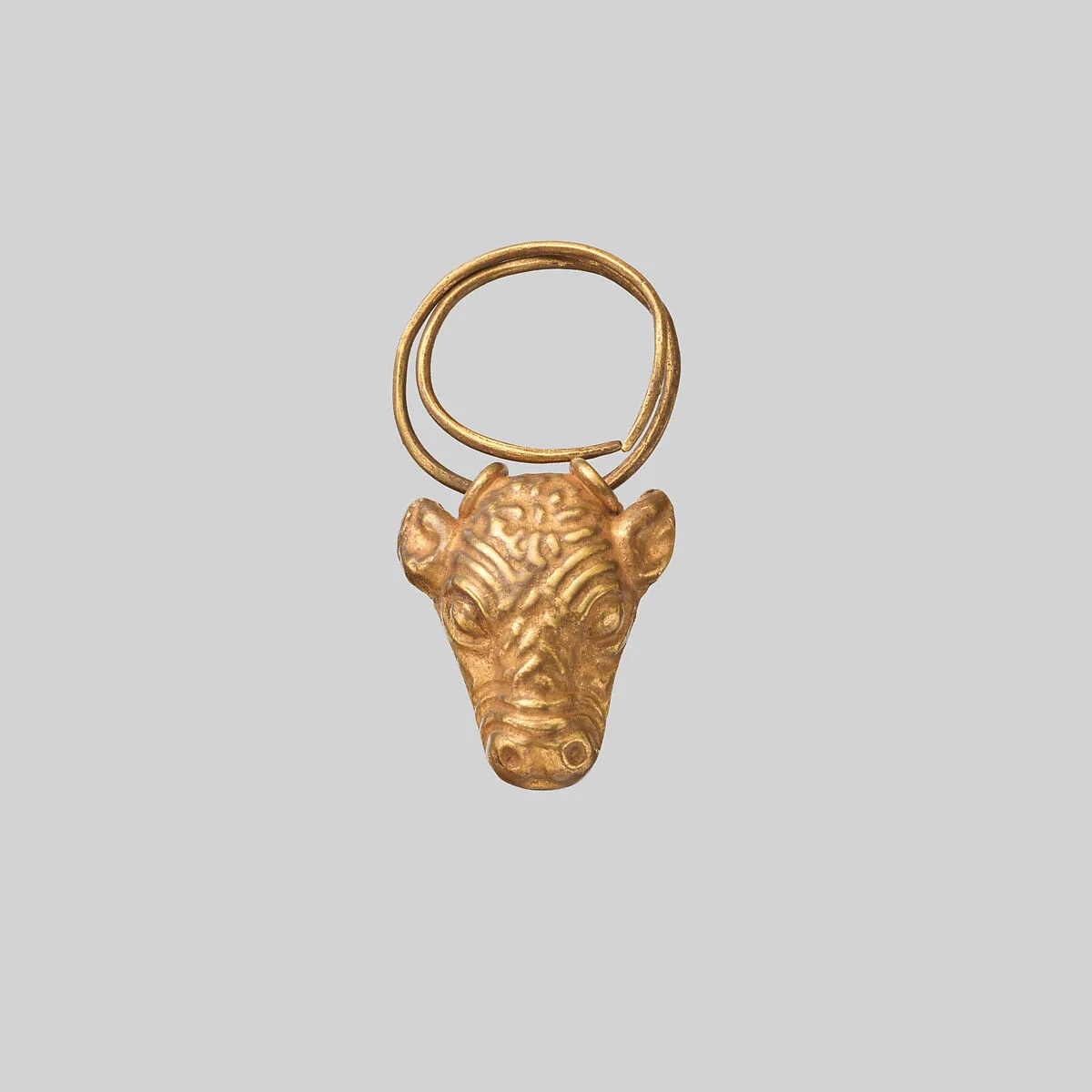 Gold earring with head of a bull — Unknown