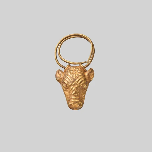 Gold earring with head of a bull