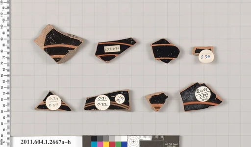 Terracotta fragments of kylikes (drinking cups)