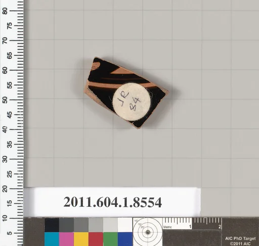 Terracotta fragment of a stemless kylix (drinking cup)