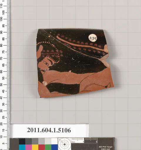 Terracotta rim fragment of a kylix (drinking cup)