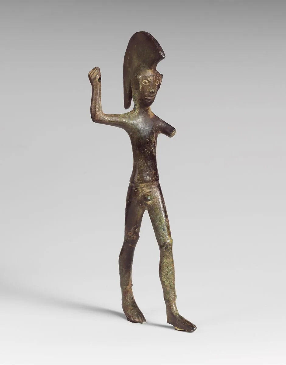Bronze statuette of a striding warrior — Unknown