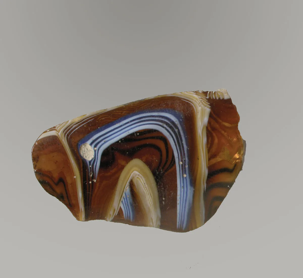 Glass mosaic ribbed bowl fragment — Unknown