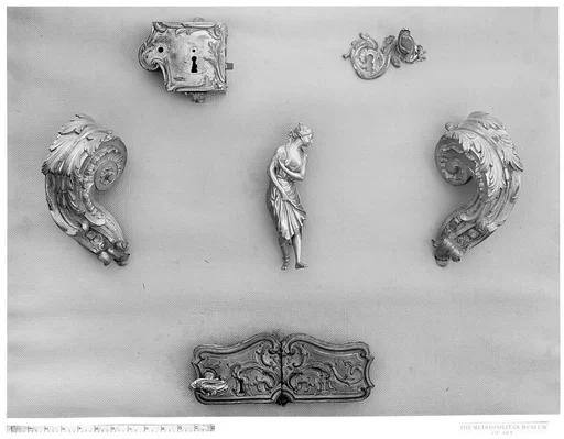 Parts of a pair of andirons