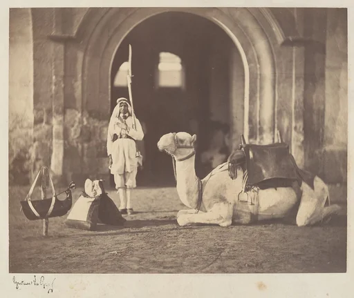[Soldier and Military Camel]