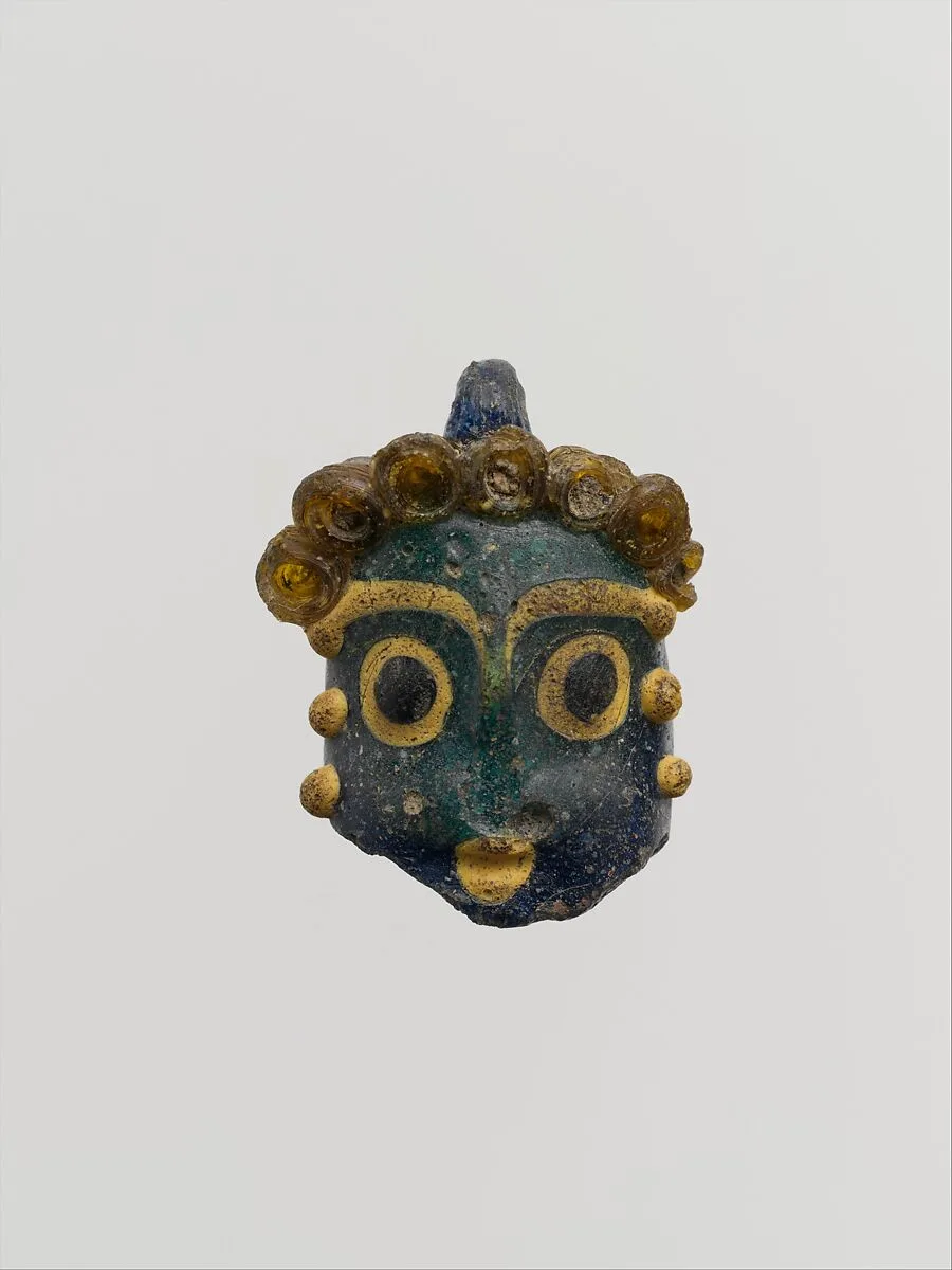 Glass head pendant — Unknown
