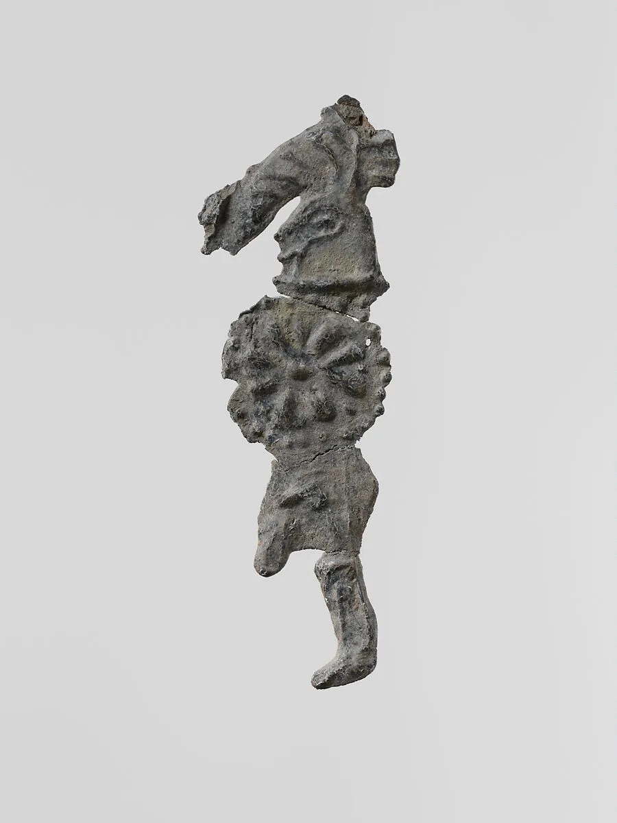 Lead figure of a warrior with a helmet and shield — Unknown
