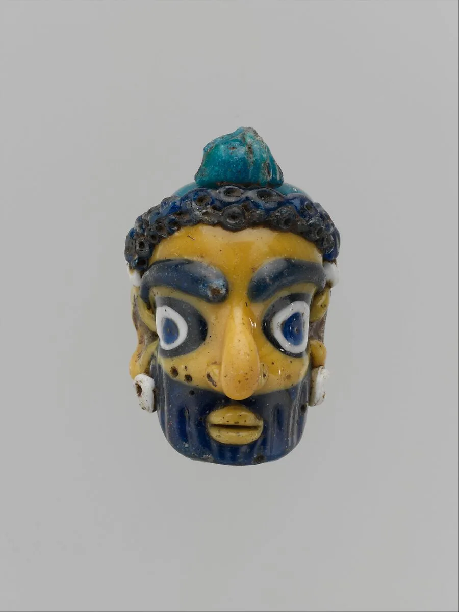 Glass head pendant — Unknown
