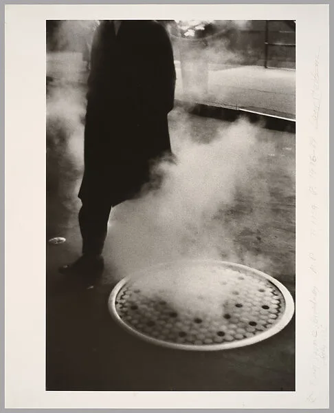 Man Near Manhole, Times Square, New York City — Louis Stettner