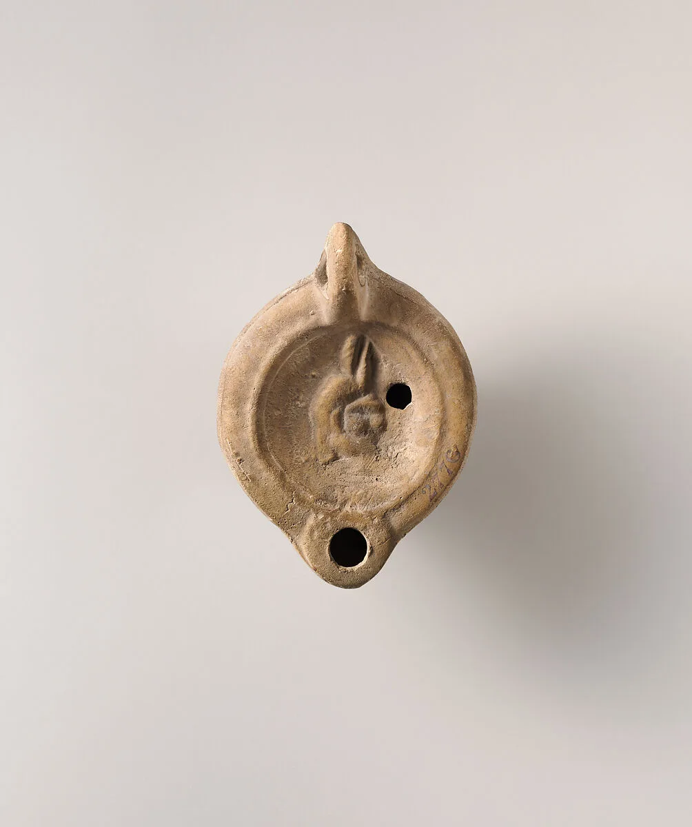 Terracotta oil lamp — Unknown