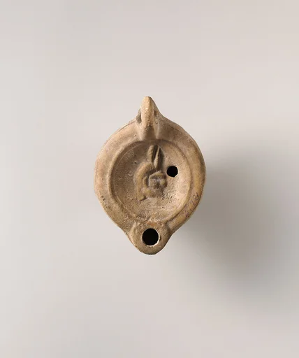 Terracotta oil lamp