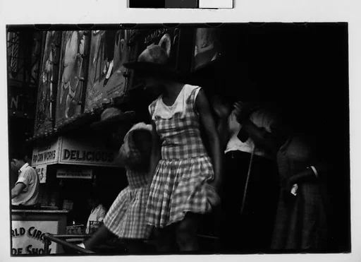 [Three 35mm Film Frames: World Circus Sideshow Dancers, New York]