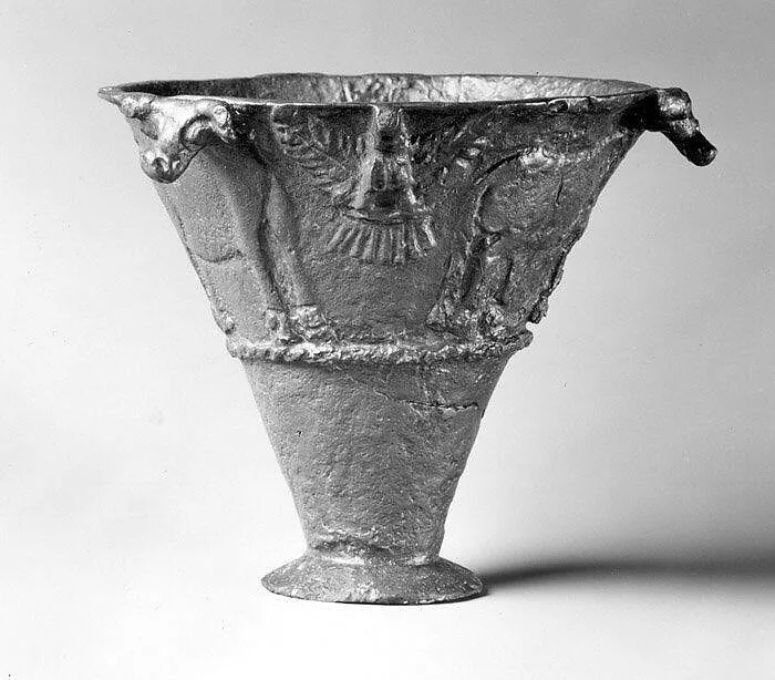 Conical beaker with relief decoration of bovines and birds of prey — Unknown