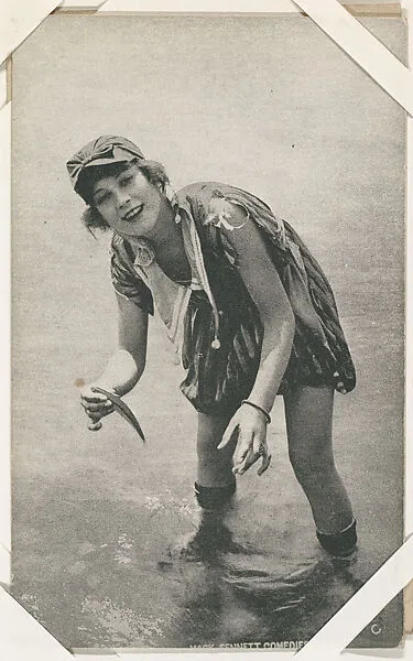 Bathing beauty holding fish from Mack Sennett Comedies Arcade series (W423) — Unknown
