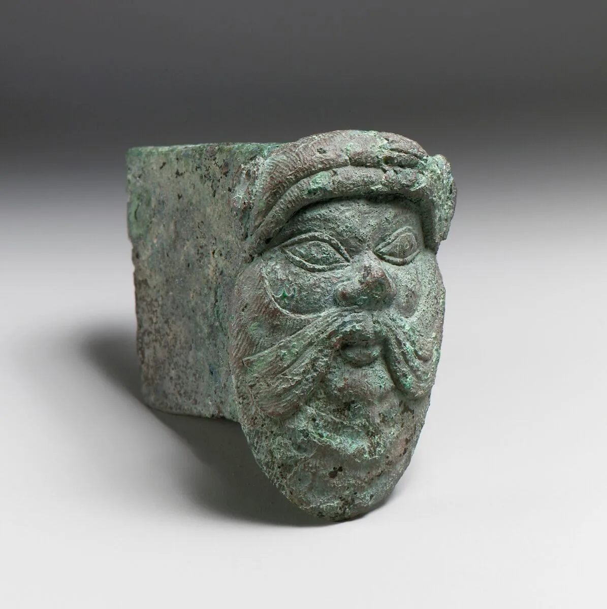 Fragment of a cart or chariot, socket with satyr mask — Unknown