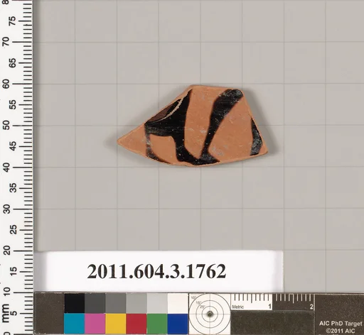 Terracotta fragment of a kylix: Band cup (drinking cup)
