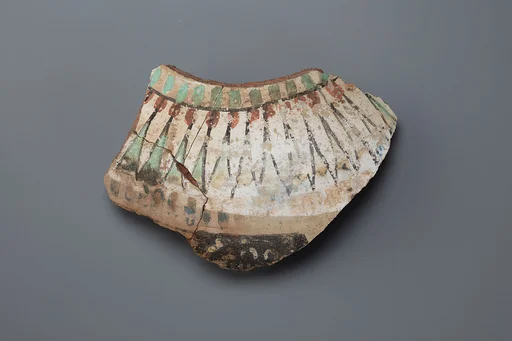 Decorated jar fragment with inscription
