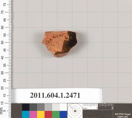 Terracotta fragment of a kylix (drinking cup)