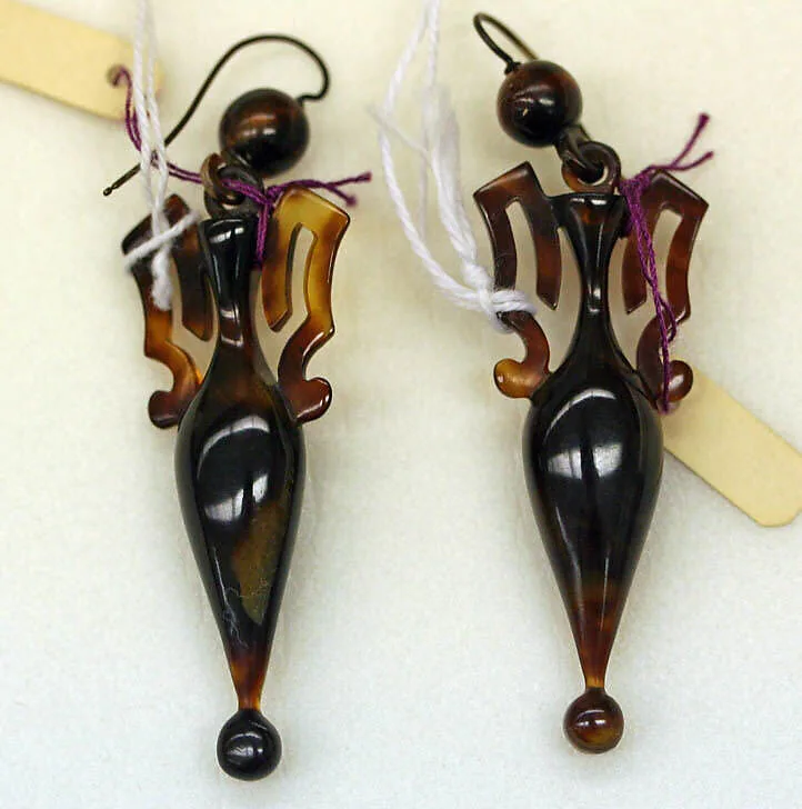 Pierced earrings — Unknown