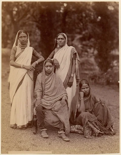 [Four Hindu Women, One Seated in a Chair, Outdoors]