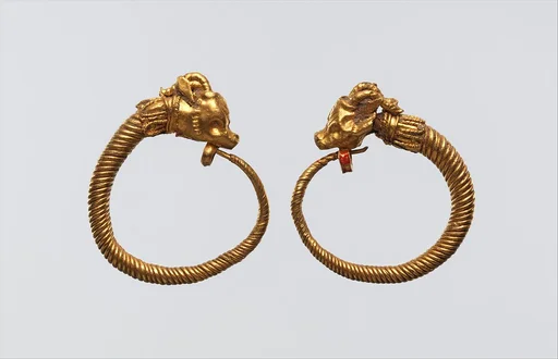 Earrings with ibex head terminal