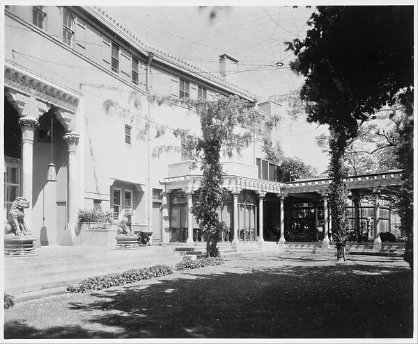 The entrance front, with pergola and entrance loggia. — David Aronow
