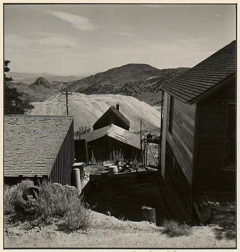 [Mining Town House and Shed with Tailings in the Background]