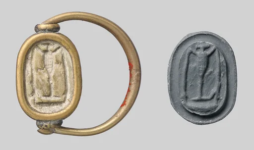 Gold ring with glass scarab
