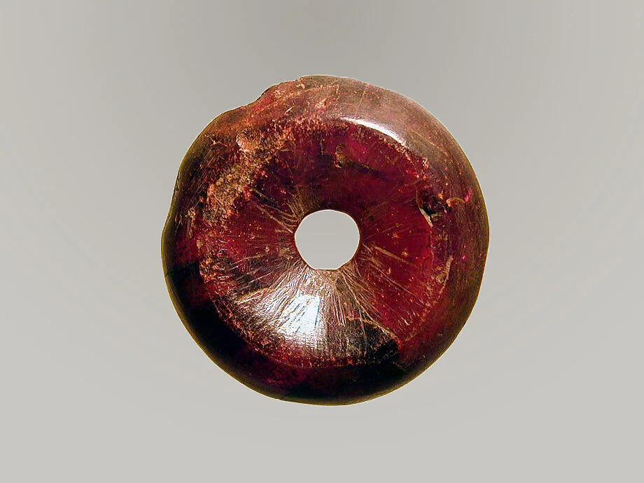 Pierced disk, perhaps from an earring or fibula (safety pin) — Unknown