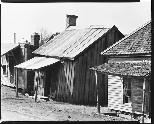 [Row of Wooden Houses, Mississippi]
